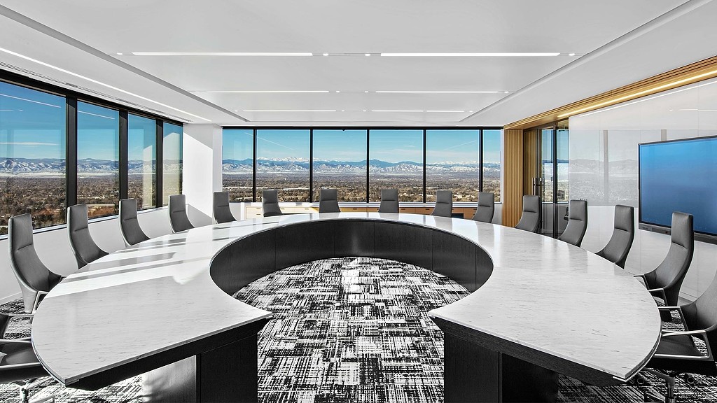 A room with tables and chairs.